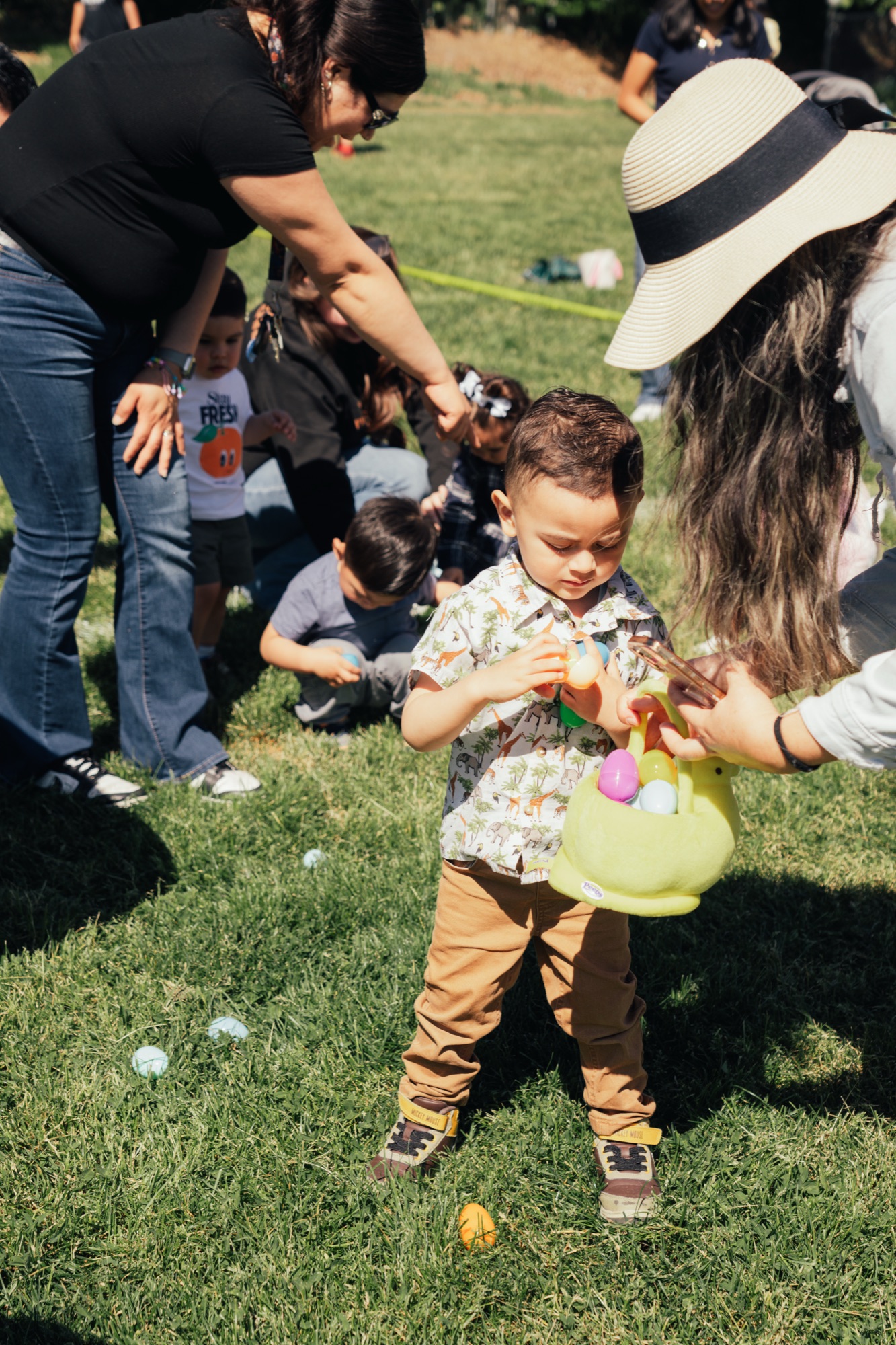 A young egg hunter inspects his haul at the club's Easter egg hunt